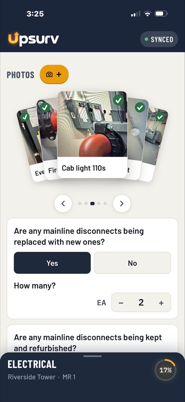 UpSurv field survey app showing electrical section photos and a question about mainline disconnects